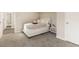 Neutral bedroom features a platform bed, and view into the ensuite bathroom at 4064 Chimney Ridge Way, Ellenwood, GA 30294