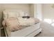 Neutral bedroom features a queen sized bed and comfortable bedding at 4064 Chimney Ridge Way, Ellenwood, GA 30294