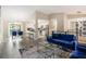 Spacious living room with a modern kitchen and dining area in the background at 4064 Chimney Ridge Way, Ellenwood, GA 30294
