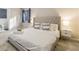 Comfortable main bedroom suite with large bed, nightstands, and ensuite bathroom at 4064 Chimney Ridge Way, Ellenwood, GA 30294