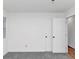 Spacious bedroom with grey carpet and double closets at 7771 Mattie Mccoy Ln, Winston, GA 30187