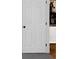 White interior door with black hardware at 7771 Mattie Mccoy Ln, Winston, GA 30187