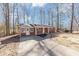Brick ranch house with a large yard at 7771 Mattie Mccoy Ln, Winston, GA 30187