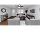 Living room with hardwood floors and ceiling fan at 7771 Mattie Mccoy Ln, Winston, GA 30187