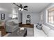 Living room with hardwood floors, view of kitchen at 7771 Mattie Mccoy Ln, Winston, GA 30187