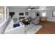 Open living room and dining area, hardwood floors at 7771 Mattie Mccoy Ln, Winston, GA 30187