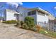 Back of the house with a screened porch and yard at 153 Hill St, Roswell, GA 30075