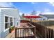 Overhead shot of a charming back deck with outdoor seating and a red umbrella at 2425 Park Ave, Austell, GA 30106