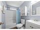 Stylish bathroom features blue accents, modern fixtures, and a shower and tub combo at 2425 Park Ave, Austell, GA 30106