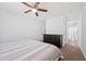 Spacious bedroom with closet, ceiling fan, neutral carpet and easy access to bathroom at 2425 Park Ave, Austell, GA 30106