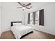 Sunlit bedroom with neutral carpet, sleek furnishings, and a large window at 2425 Park Ave, Austell, GA 30106