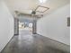 Spacious garage with a ceiling light and an automatic door at 2425 Park Ave, Austell, GA 30106