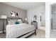 Comfortable main bedroom with carpeted floors and en-suite bathroom access at 2656 Brookview Nw Ln, Atlanta, GA 30318