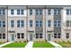 Charming townhome exteriors with brick facade, large windows, and well-manicured lawns at 2656 Brookview Nw Ln, Atlanta, GA 30318