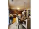 Kitchen with an island, stainless steel appliances, and a dining area at 730 Donner Ct, Mcdonough, GA 30252