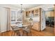 Cozy dining area with a modern chandelier and built-in cabinets at 85 Sara Dr, Covington, GA 30016