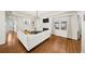 Comfortable living room with a fireplace, hardwood floors, and ample natural light at 85 Sara Dr, Covington, GA 30016