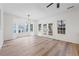 Bright dining area with hardwood floors and access to backyard at 132 Timber Mist Ln, Lawrenceville, GA 30045