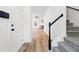 Bright entryway with hardwood floors and staircase at 132 Timber Mist Ln, Lawrenceville, GA 30045