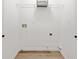Laundry room with built-in shelving at 132 Timber Mist Ln, Lawrenceville, GA 30045
