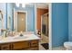 Clean bathroom with a vanity, shower, and toilet at 2020 Temple Johnson Rd, Loganville, GA 30052