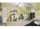 Bright bedroom with desk, chair, and a futon at 2020 Temple Johnson Rd, Loganville, GA 30052