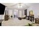 Spacious bedroom with ample closet space and a view at 2020 Temple Johnson Rd, Loganville, GA 30052