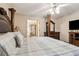 Spacious main bedroom with large bed, dresser, and ensuite bathroom at 2020 Temple Johnson Rd, Loganville, GA 30052
