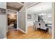 Bright entryway with view of dining room and fireplace in living room at 2020 Temple Johnson Rd, Loganville, GA 30052