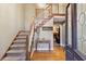 Two-story entryway with hardwood floors and staircase at 2020 Temple Johnson Rd, Loganville, GA 30052