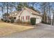 Two-story house with a wraparound porch and attached garage at 2020 Temple Johnson Rd, Loganville, GA 30052