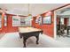 Basement game room with pool table, wet bar, and built-in shelving at 2020 Temple Johnson Rd, Loganville, GA 30052