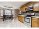 Bright kitchen with stainless steel appliances and an eat-in area at 2020 Temple Johnson Rd, Loganville, GA 30052