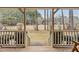 View from porch, showcasing the backyard and trees at 2020 Temple Johnson Rd, Loganville, GA 30052