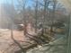View of wooded backyard from window at 5950 Wintergreen Rd, Norcross, GA 30093