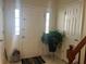 Inviting entryway with a large front door and potted plant at 5950 Wintergreen Rd, Norcross, GA 30093