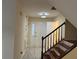 Bright entryway with front door and stairs leading upstairs at 5950 Wintergreen Rd, Norcross, GA 30093