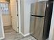 Stainless steel refrigerator in kitchen at 5950 Wintergreen Rd, Norcross, GA 30093