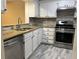 Kitchen with granite countertops and stainless steel appliances at 5950 Wintergreen Rd, Norcross, GA 30093