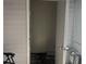 Small storage room with flooring and shelving at 5950 Wintergreen Rd, Norcross, GA 30093