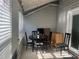 Sunroom with table, chairs, and storage cabinet at 5950 Wintergreen Rd, Norcross, GA 30093