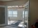 Bright and airy sunroom, easily accessed through French doors at 5950 Wintergreen Rd, Norcross, GA 30093