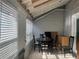 Sunroom with table, chairs, and storage cabinet at 5950 Wintergreen Rd, Norcross, GA 30093