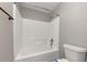 Bathroom with shower/tub combo and toilet at 7502 Springbox Dr, Fairburn, GA 30213
