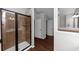 Bathroom with a large walk-in shower and dark brown tile at 7502 Springbox Dr, Fairburn, GA 30213