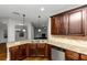 Spacious kitchen with granite island and stainless steel appliances at 7502 Springbox Dr, Fairburn, GA 30213