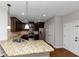 Modern kitchen with granite countertops and stainless steel appliances at 7502 Springbox Dr, Fairburn, GA 30213