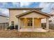 Covered patio perfect for outdoor entertaining at 7502 Springbox Dr, Fairburn, GA 30213