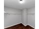 Large walk-in closet with wire shelving and dark floors at 7502 Springbox Dr, Fairburn, GA 30213