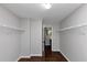 Spacious walk-in closet with wire shelving and access to bathroom at 7502 Springbox Dr, Fairburn, GA 30213